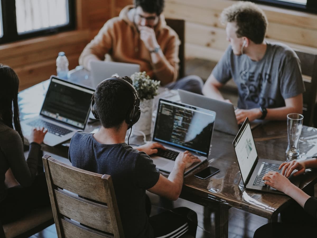 Distributed team collaborating on a product — remote full stack development for US and UK startups